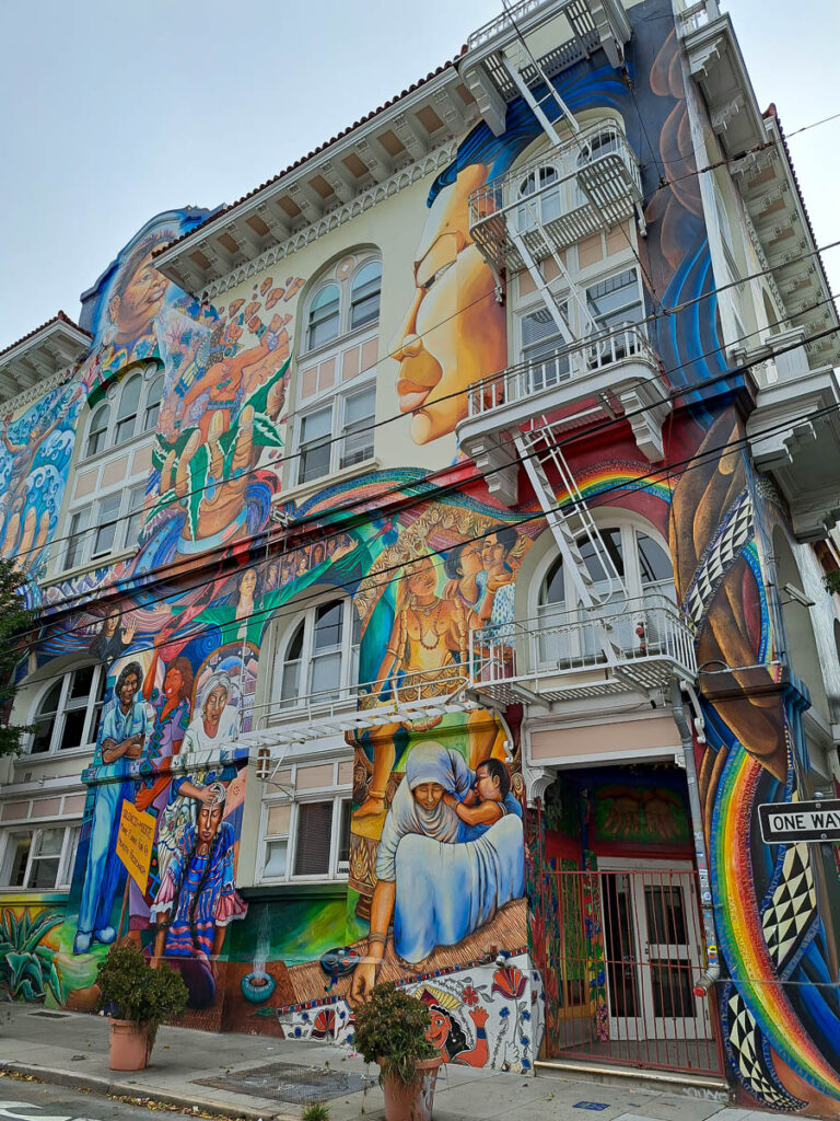 Colorful Maestrapeace Mural on the Women's Building depicting important women in history in San Francisco, California, United States.