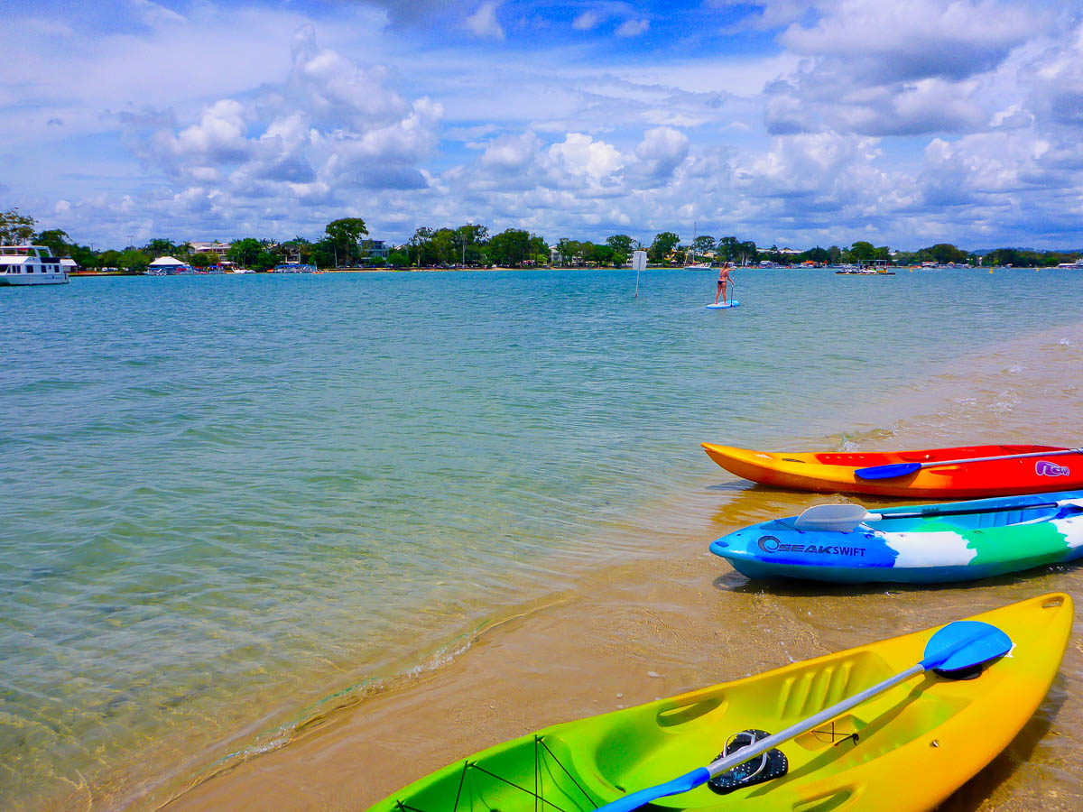 Finding accommodation with free kayaks to use is one of our top budget travel tips. Even better when it's on a turquoise water river leading into the ocean with mangroves on either side.