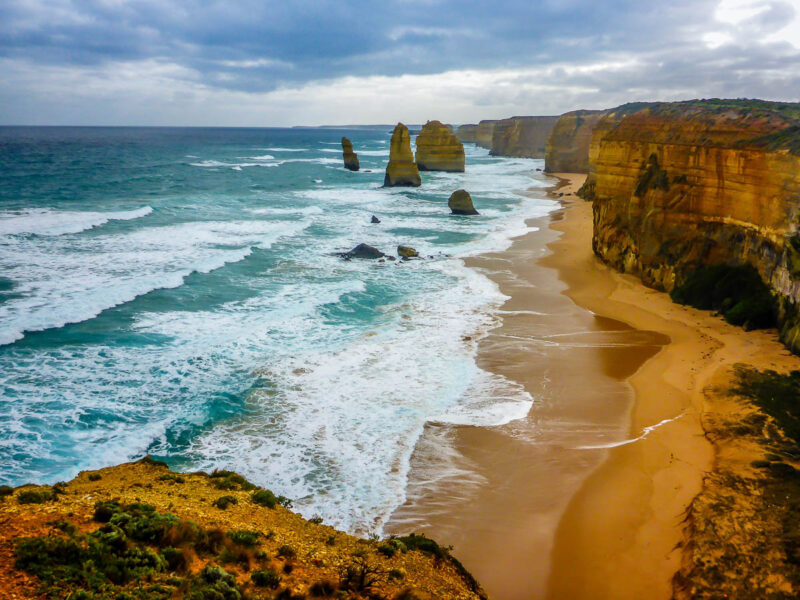 A view from a cliffside of the 12 Apostles on the Great Ocean Road in Australia